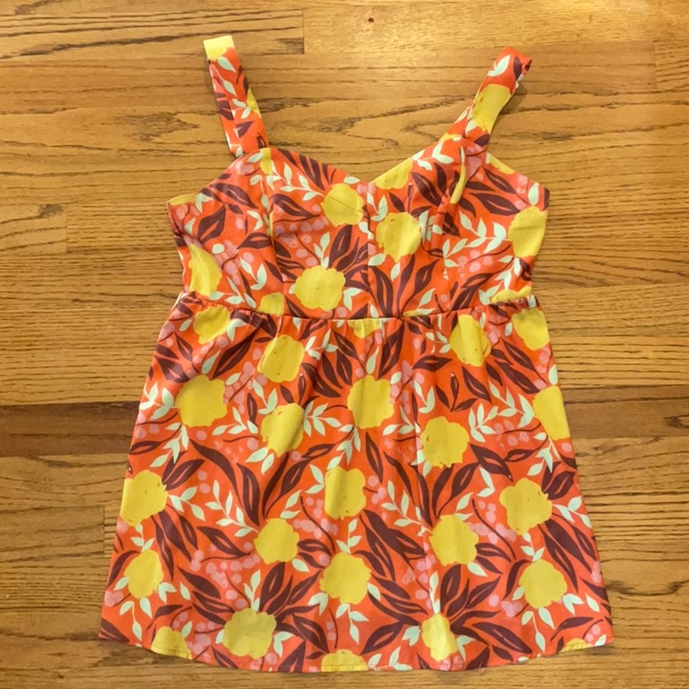 ModCloth size L orange floral top with adjustable straps & stretch shirred back.